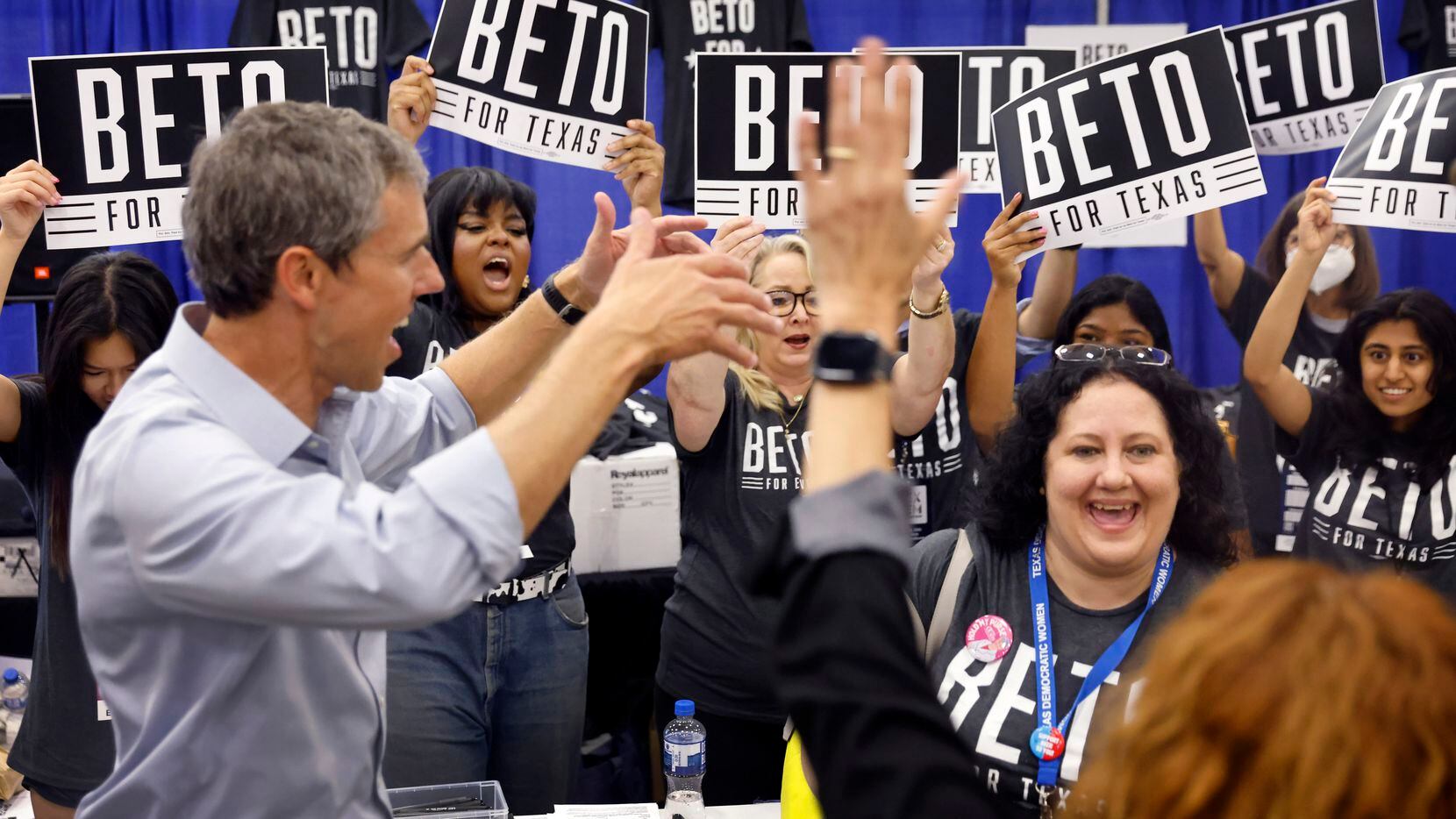 Democratic gubernatorial challenger Beto O'Rourke cheers supporters as they took photos with...