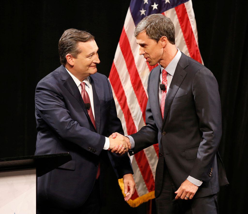 Republican U.S. Senator Ted Cruz and Democratic U.S. Representative Beto O'Rourke shake...