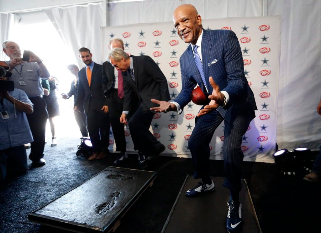 Dallas Cowboys Drew Pearson assumes the position from the "Hail Mary," catch while standing...