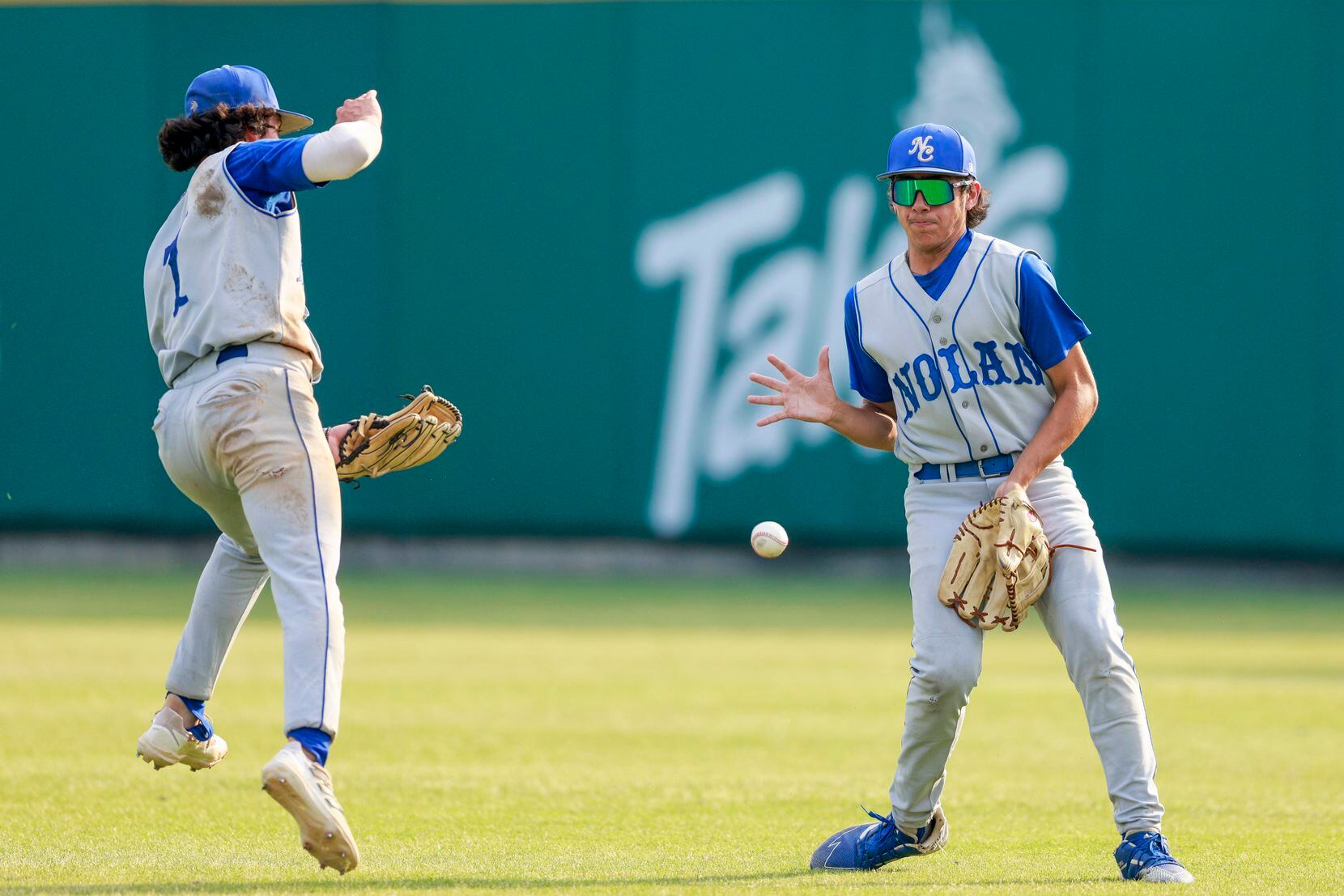 Fort Worth Nolan Robert Nagid (left) and right fielder Benjamin Sanchez misplay a fly ball...