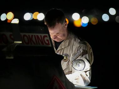 Texas Department of Public Safety pilot Lt. Donny Kindred stop to refuel a DPS helicopter on...