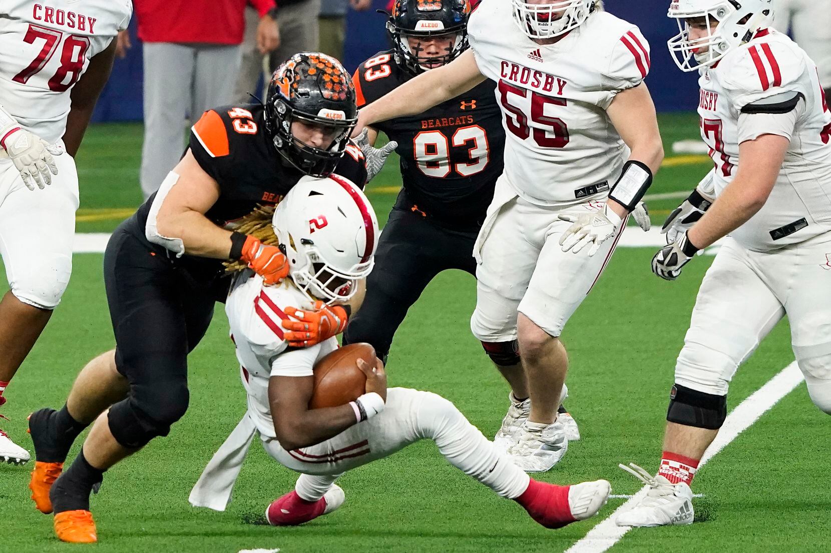 Crosby Deniquez Dunn (2) is sacked by Aledo defensive lineman Kyle Thompson (43) during the first half of the Class 5A Division II state football championship game at AT&T Stadium on Friday, Jan. 15, 2021, in Arlington. (Smiley N. Pool/The Dallas Morning News)