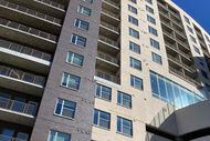 Lenders in February foreclosed on the Gabriella apartment high-rise located on Live Oak...
