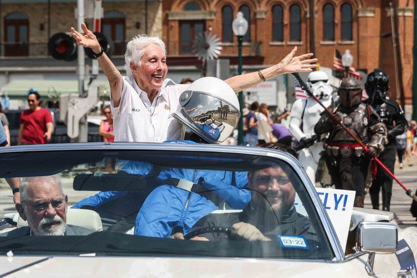 Wally Funk, 82, waved during a parade in her honor Aug. 7 in Grapevine after she flew into...