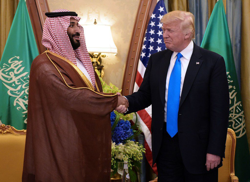 U.S. President Donald Trump and Saudi Deputy Crown Prince Mohammad bin Salman al-Saud take...