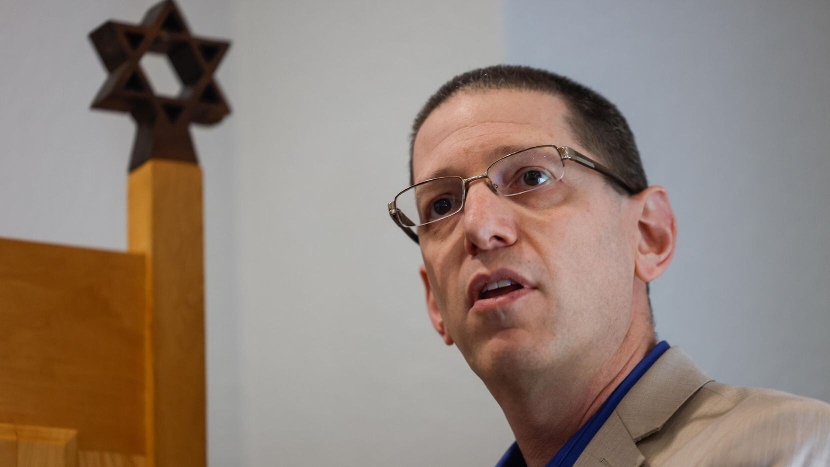 Rabbi Charlie Cytron-Walker speaks during a press conference at the Congregation Beth Israel...