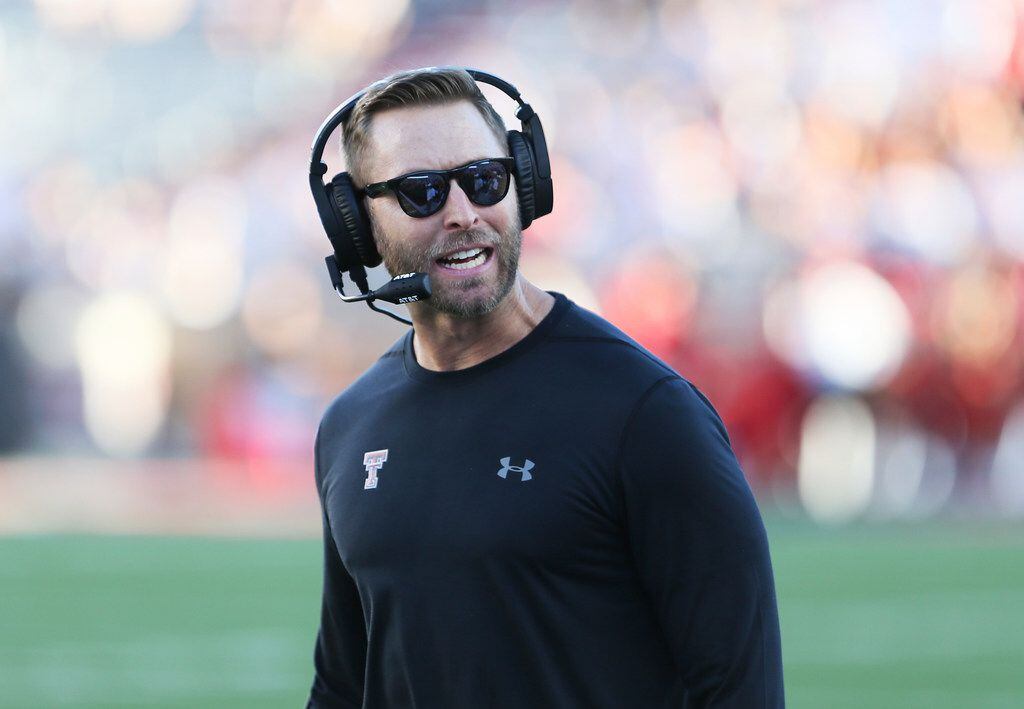 Texas Tech coach Kliff Kingsbury reacts to a play during the NCAA college football game...