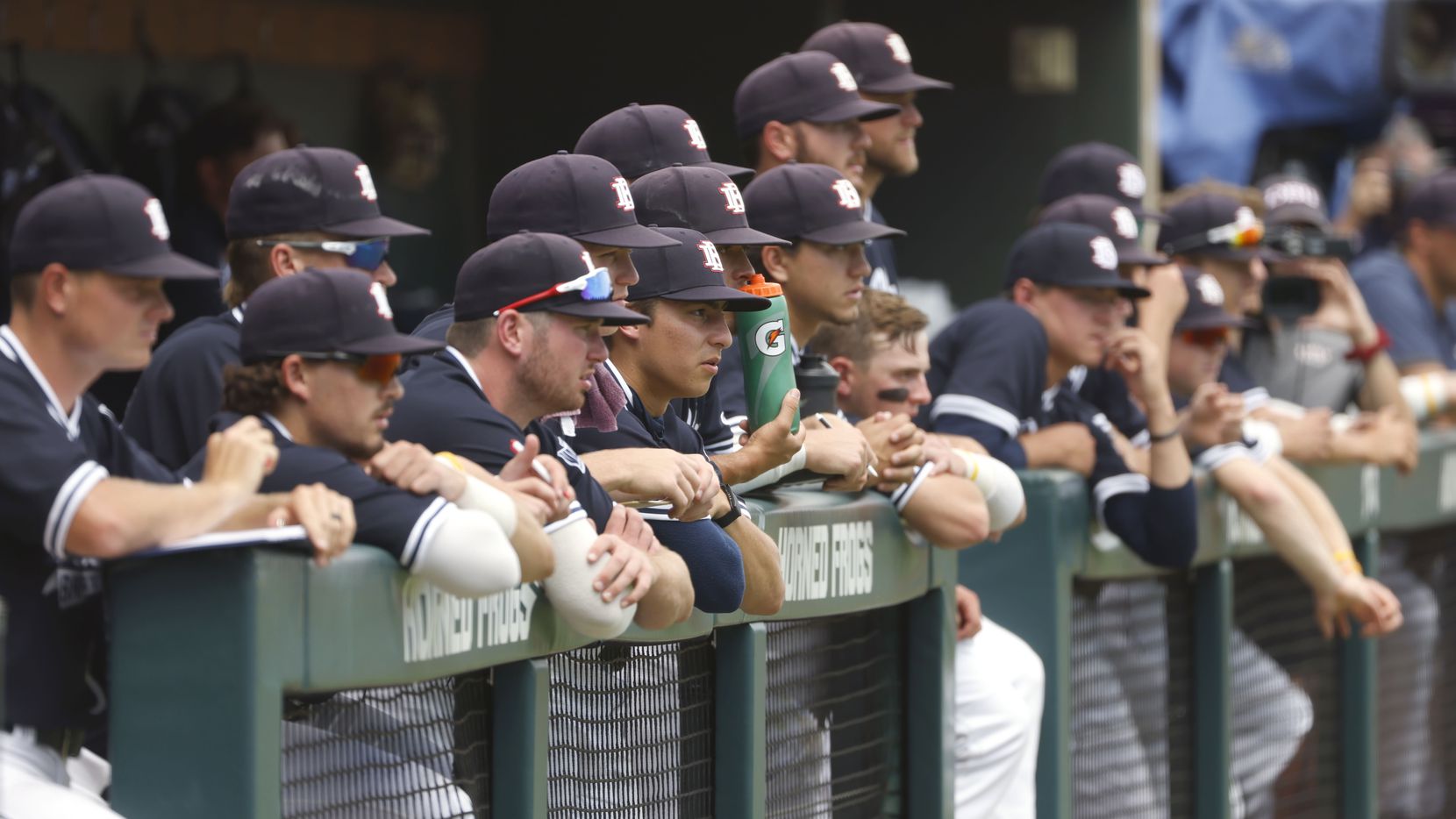 Dallas Baptist watches the action from the dugout against Oregon St. in the first inning during the NCAA Division I Baseball Regional Championship game in Fort Worth, Texas on June 7, 2021.