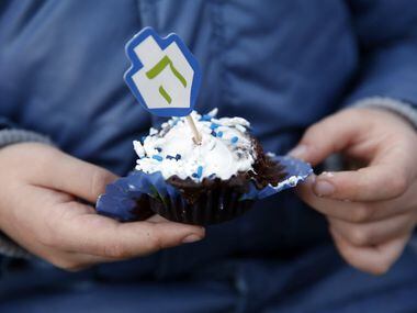 Frisco's Hanukkah celebration included cupcakes with dreidel-shaped toppers.