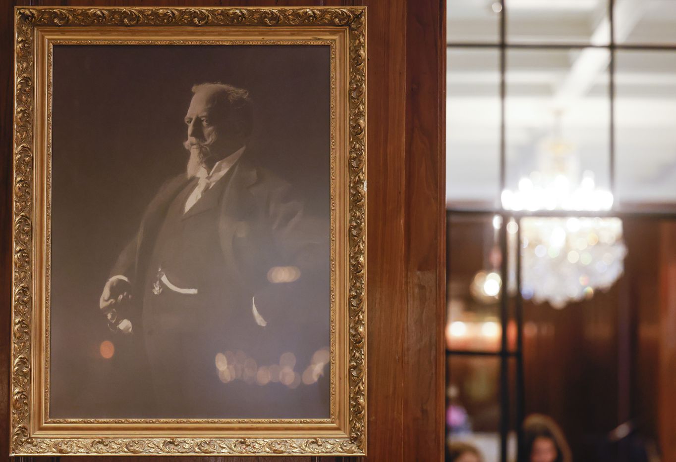 A portrait of co-founder Adolphus Busch hangs in the City Hall Bar room of Adolphus Hotel in...