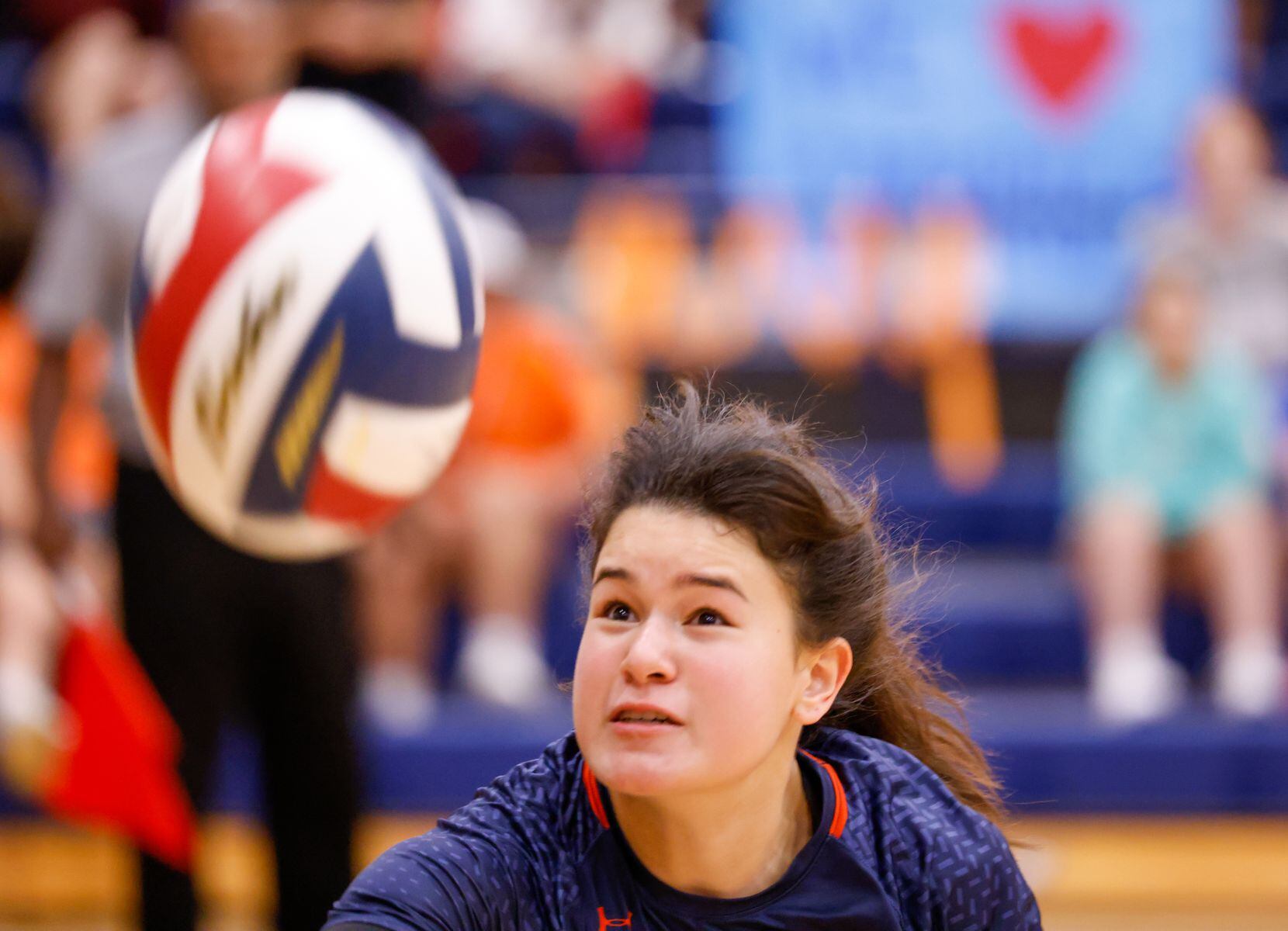 McKinney North Maya Rhamy (9) dives for the ball in the final set of a match against Lovejoy...