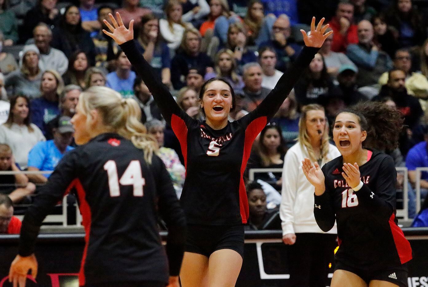 Colleyville Heritage High School's Suli Davis (5) leads the reaction to winning a point...
