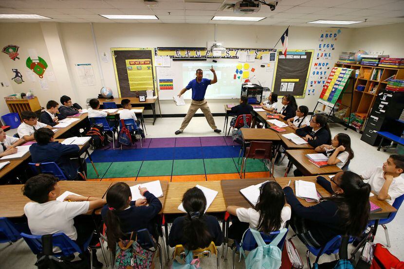 Josue Tamarez Torres teaches his fifth grade bilingual class at Annie Webb Blanton...
