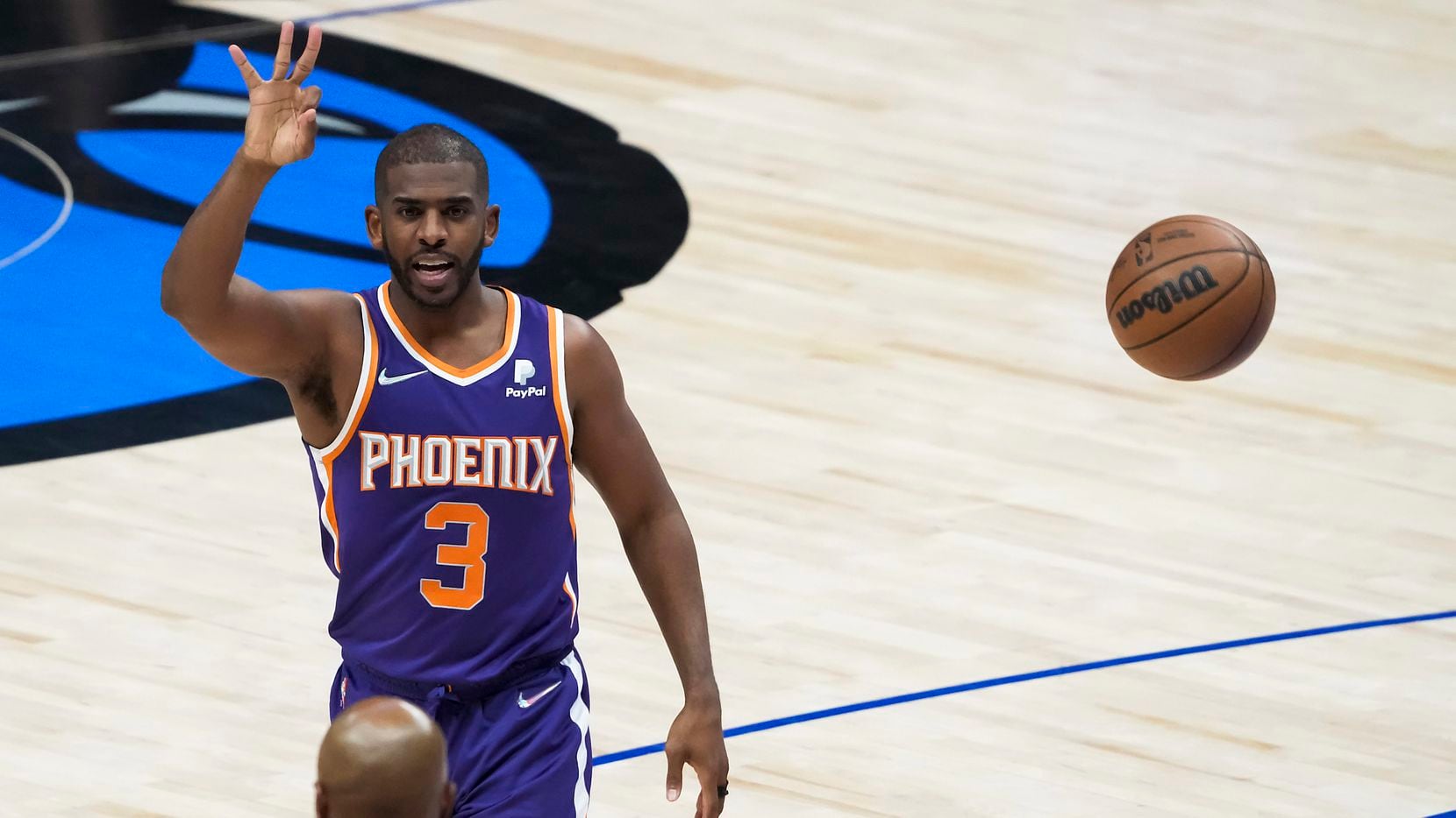 Phoenix Suns guard Chris Paul (3) reacts after being fouled by Dallas Mavericks forward Maxi...