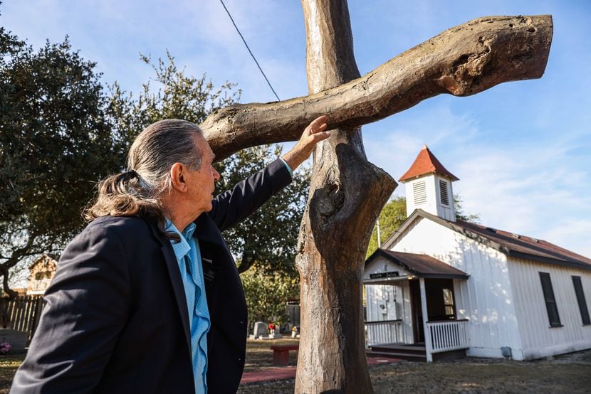 Ramiro Ramirez, 72, talks about how he built a cross with wood that he collected from his...