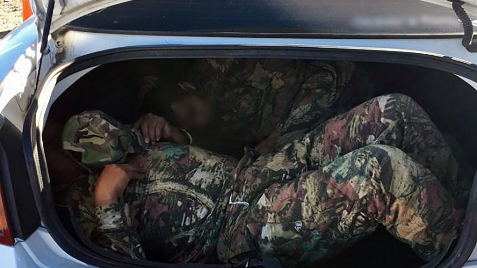 Border Patrol agents found two migrants, from Mexico and Guatemala, hidden in a trunk and...