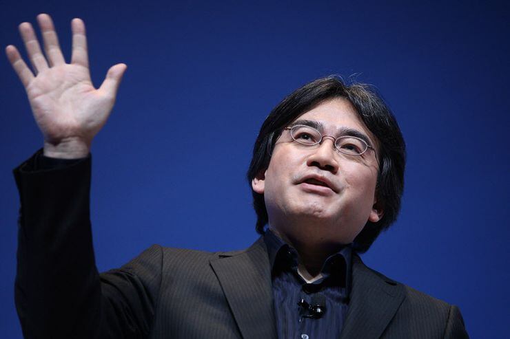 Nintendo President Satoru Iwata speaks as he unveils a Nintendo