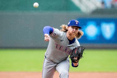 Texas Rangers' pitcher Jon Gray throws during the first inning of a baseball game against...