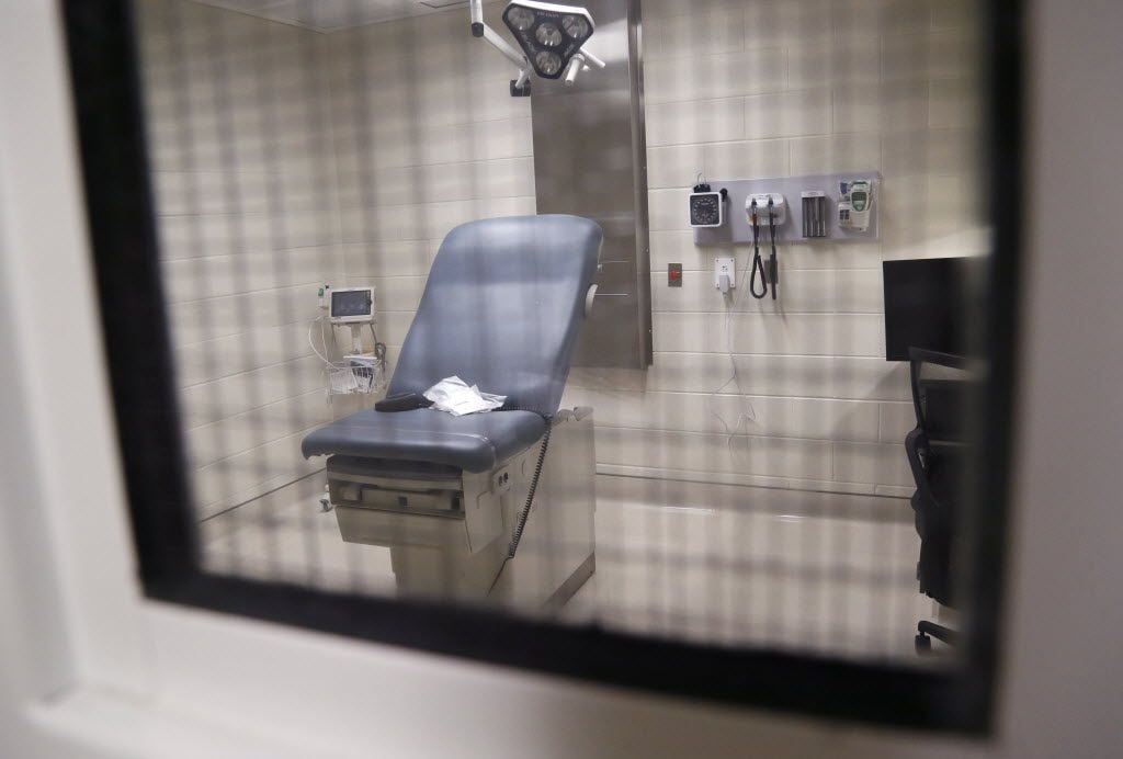 A view of a patient exam room on the mental health section of the medical facility inside...