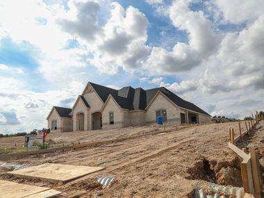 Construction continues on a new home in the Putteet Hill housing development in Cresson.
