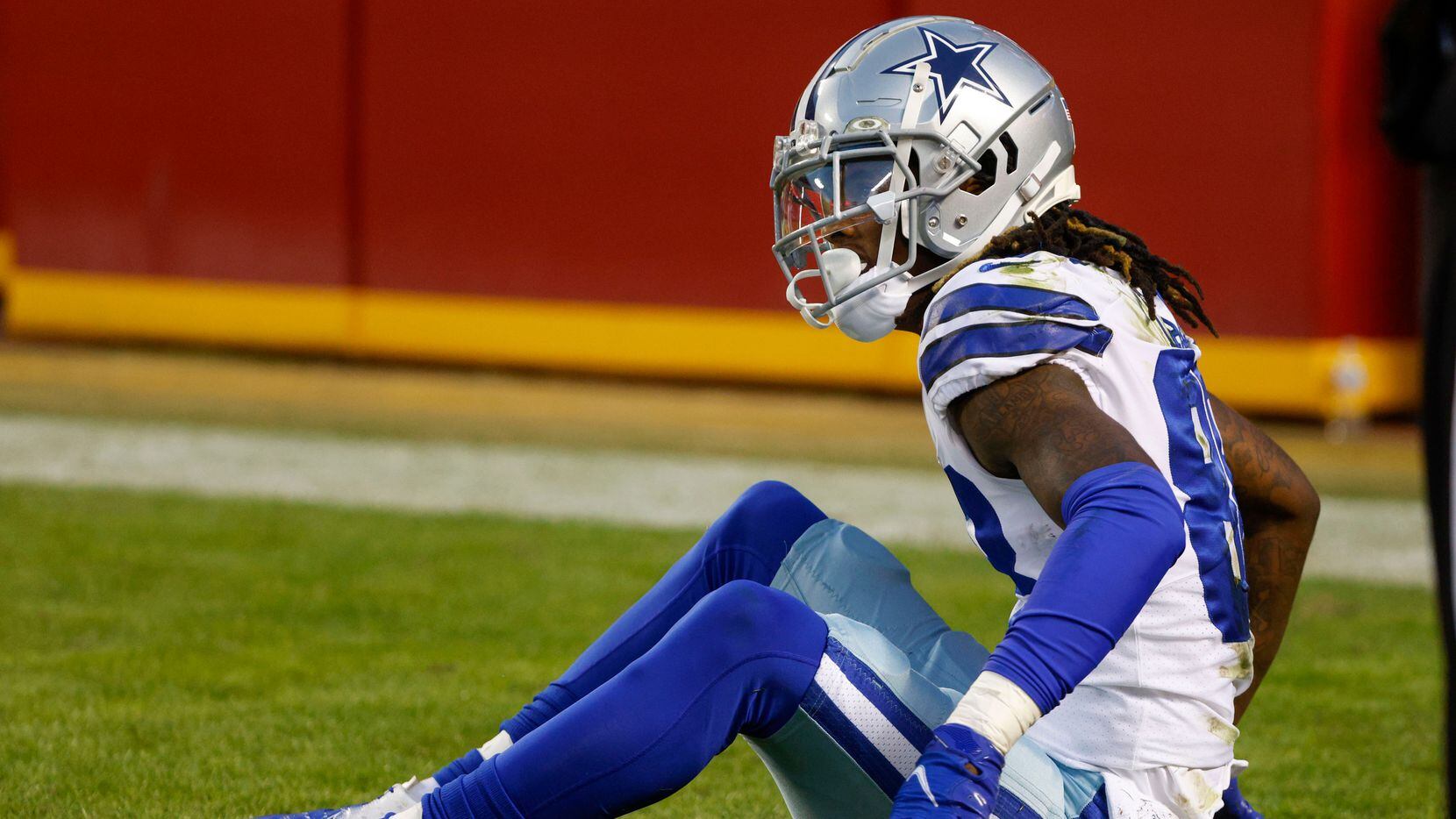 Dallas Cowboys wide receiver CeeDee Lamb (88) sits in the end zone after an interception...