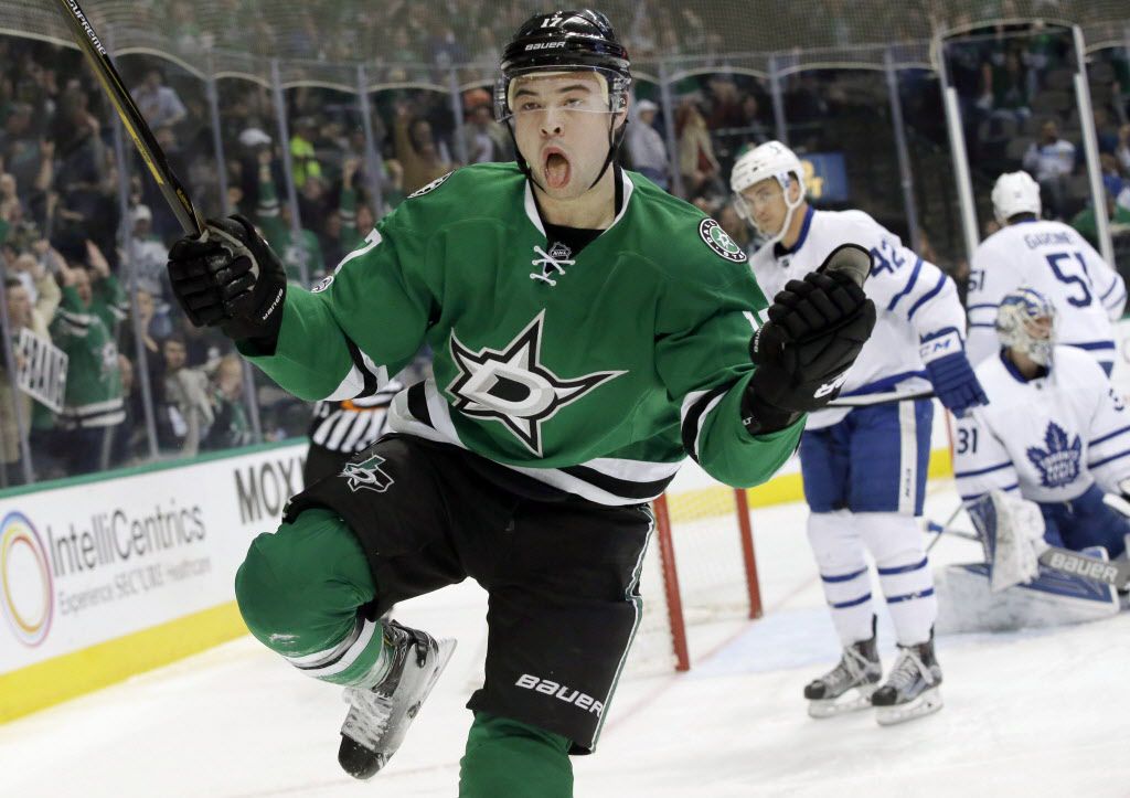 Dallas Stars center Devin Shore (17) reacts to scoring a goal against Toronto Maple Leafs goalie Frederik Andersen (31), center Tyler Bozak (42) and defenseman Jake Gardiner (51) during the first period of an NHL hockey game in Dallas, Tuesday, Jan. 31, 2017. (AP Photo/LM Otero)