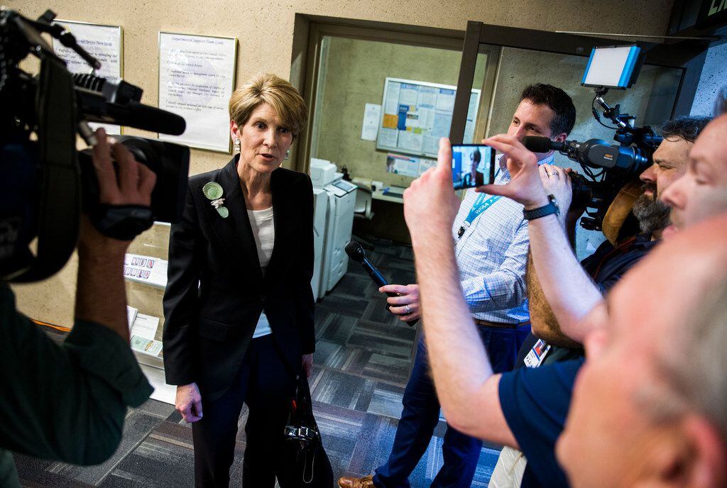Former Dallas Mayor Laura Miller speaks to reporters as she leaves the City Secretary's office after filing the required petition signatures to secure a place on the ballot for Dallas City Council District 13 on Friday, February 15, 2019 at Dallas City Hall. (Ashley Landis/The Dallas Morning News)