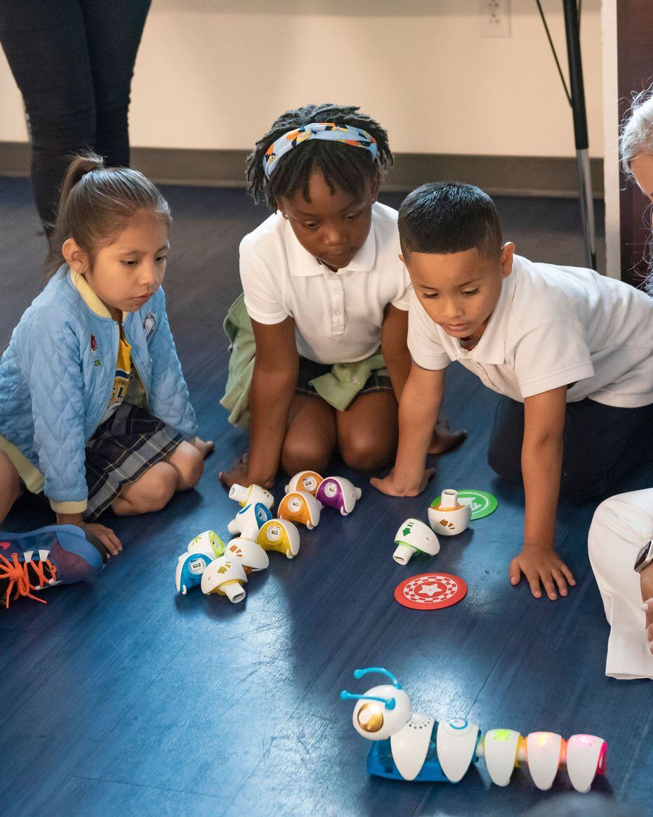 1st grade students experience the fundamentals of coding with a robotic worm.