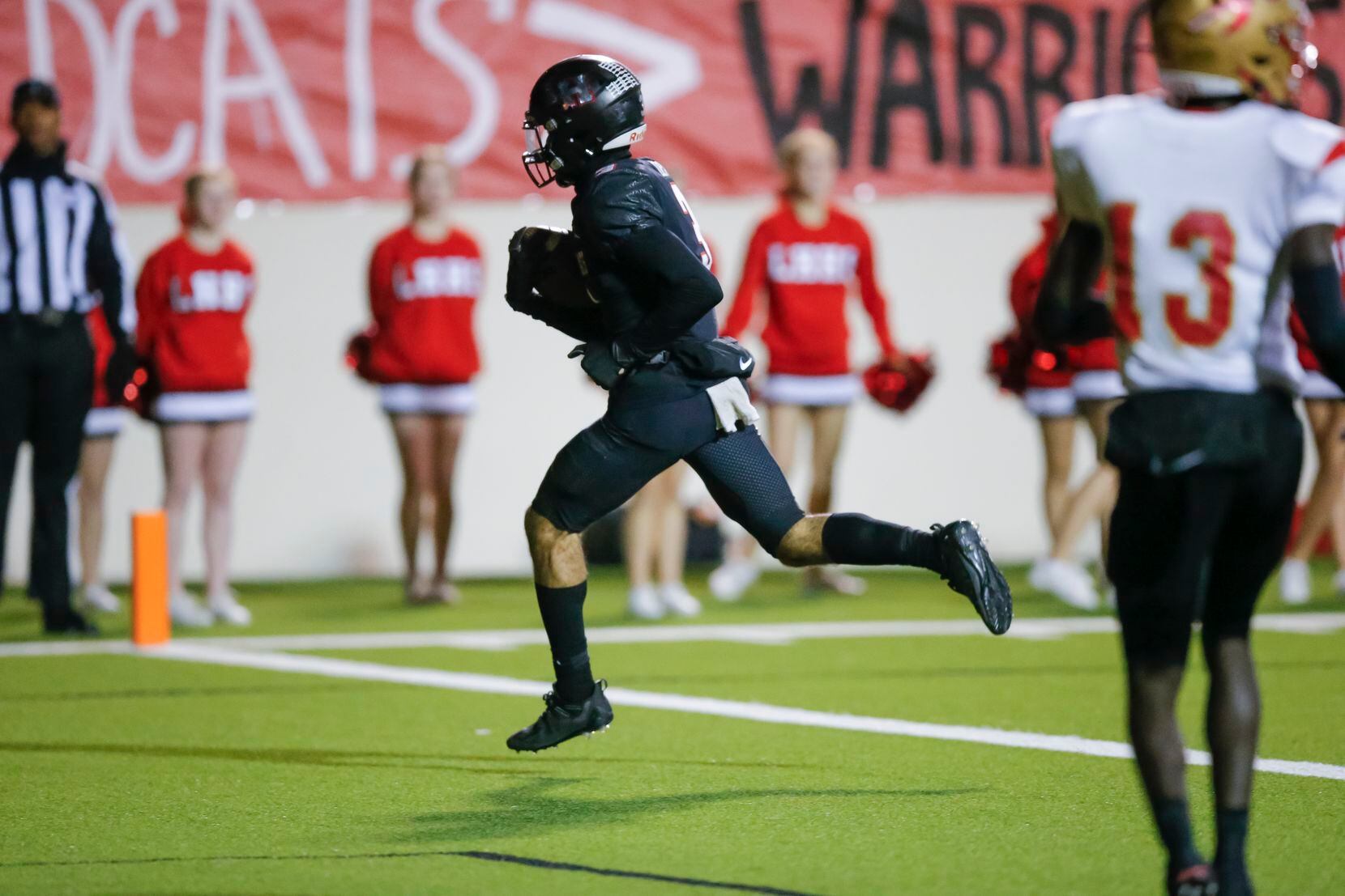 Lake Highlands sophomore wide receiver Deonte Dean (3) carries a pass in for a touchdown...