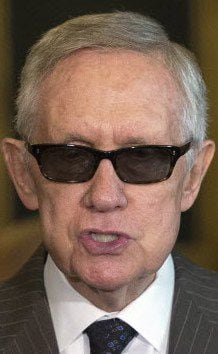 Sen. Harry Reid retired from the U.S. Senate this year — but may still be a Man in Black, judging by the shades.
