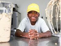 Dallas Wise, 12, after making chocolate chip cookie dough, Friday, Nov. 18, 2022, in Dallas....