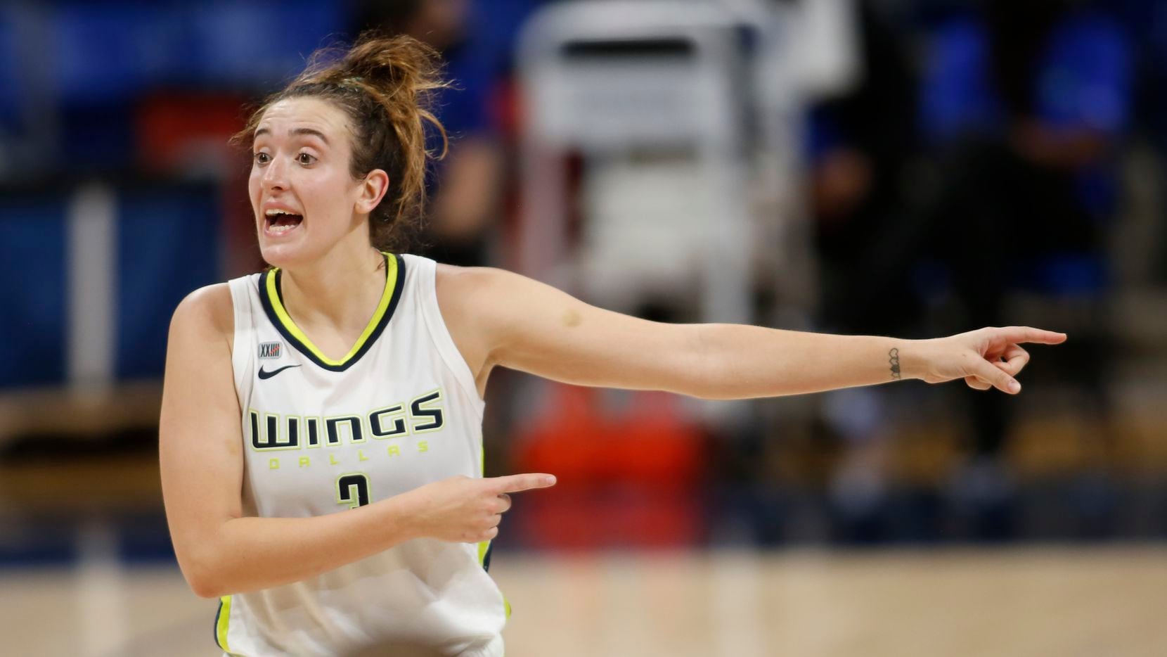 Dallas Wings guard Marina Mabry (3) directs teammates during first half action against Seattle. The Wings hosted the Storm for their WNBA 2021season home opener at UTA's College Park Center in Arlington on May 22, 2021.