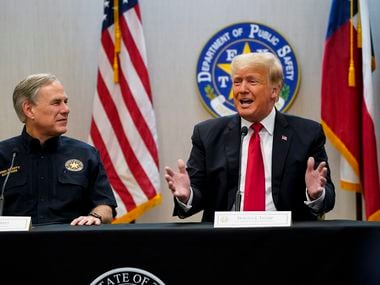 Texas Gov. Greg Abbott and former President Donald Trump attend a briefing on border security with state officials and law enforcement at the Weslaco Department of Public Safety DPS Headquarters before touring the US-Mexico border wall on June 30, 2021.  Trump was invited to South Texas by  Abbott, who has taken up his immigration mantle by vowing to continue building the border wall.