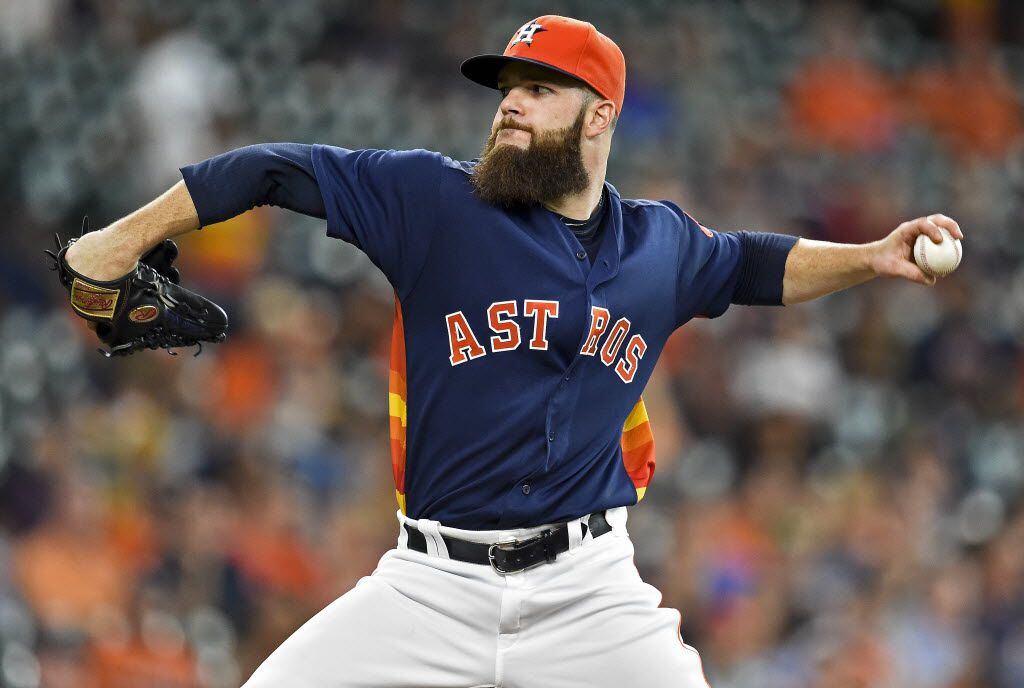 Houston Astros starting pitcher Dallas Keuchel delivers in the second inning of a baseball...