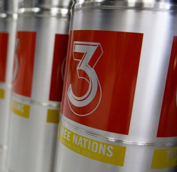 A row of empty kegs line a wall at Three Nations Brewing Friday, October 16, 2015 in Farmers...