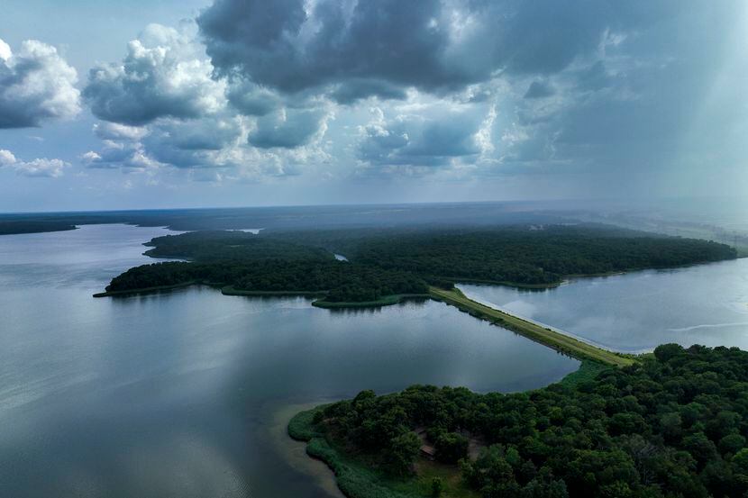Aerial view of Fairfield Lake with storms rolling in shown looking from the north toward...