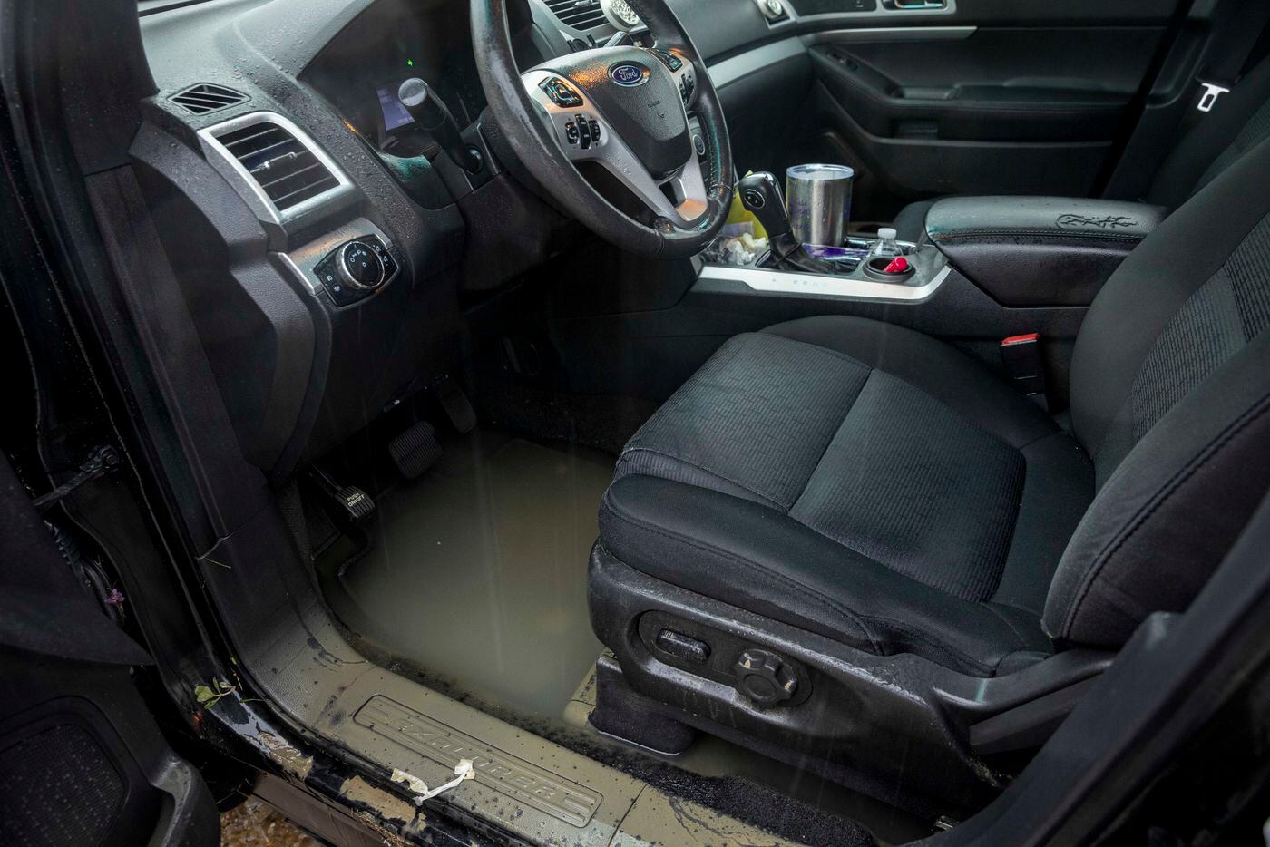 Water remains inside of Galloway Elementary School principal April Sarpy’s car after she was...