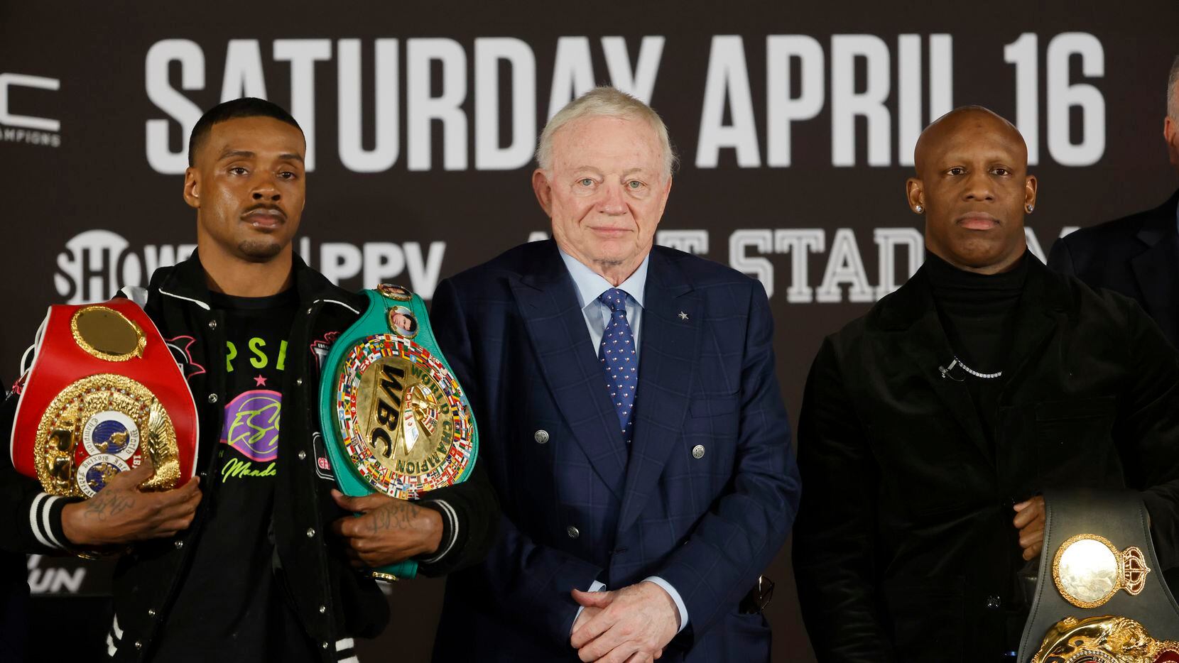 WBC and IBF world champion Errol “The Truth” Spence Jr., left, Dallas Cowboys owner Jerry...