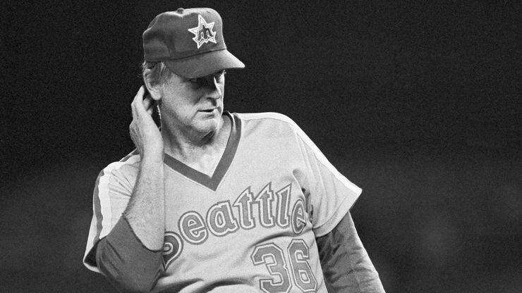 Seattle Mariners pitcher Gaylord Perry prepares to throw a pitch during a game against the...