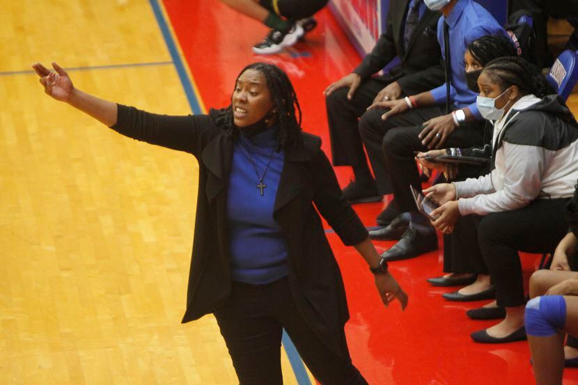 Duncanville head coach LaJeanna Howard directs her players from the team bench area during...