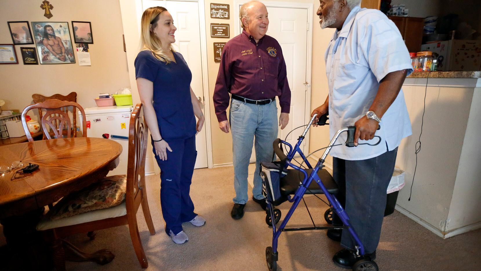 Meals on Wheels recipient George Kelley visited with Abby Tupper and her father Charlie...