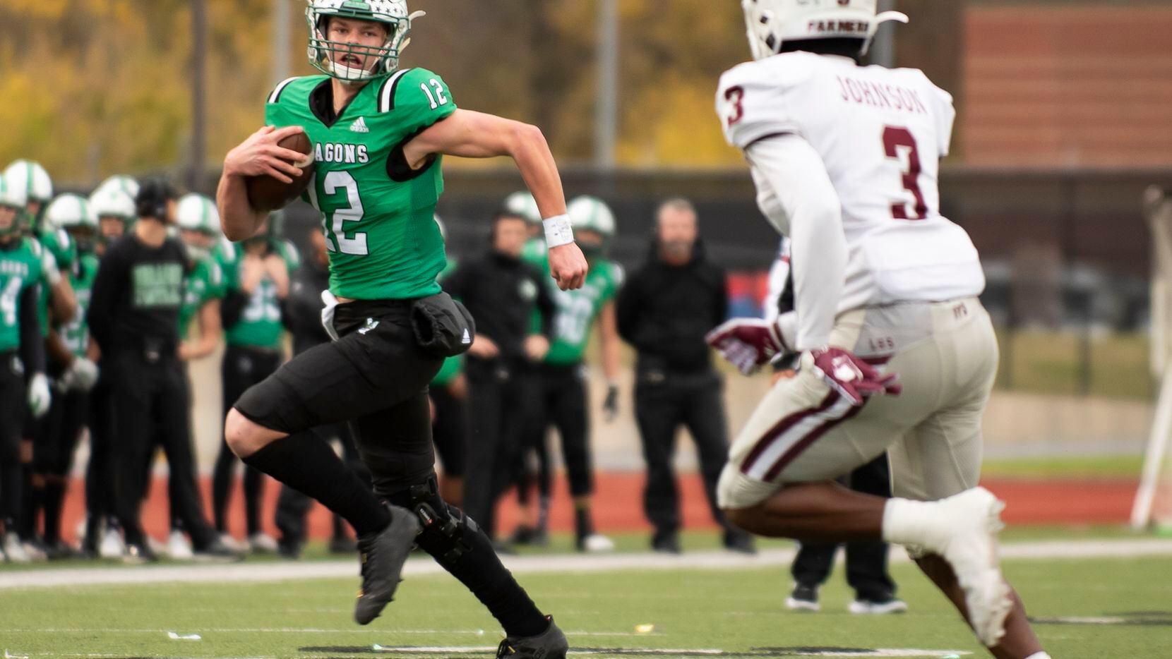 Southlake Carroll junior Kaden Anderson (12) rushes down the field as Lewisville senior...