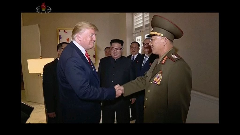 Then Trump and the North Korean general shook hands. (KRT via AP Video)