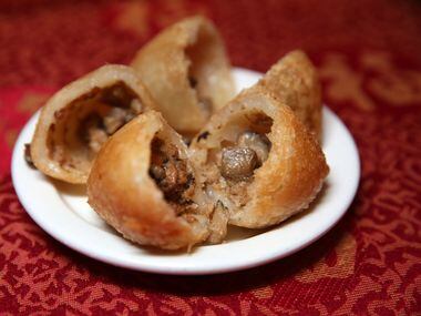 Glutinous pork dumpling at Kirin Court. The savory pastry is filled with pork and fried....