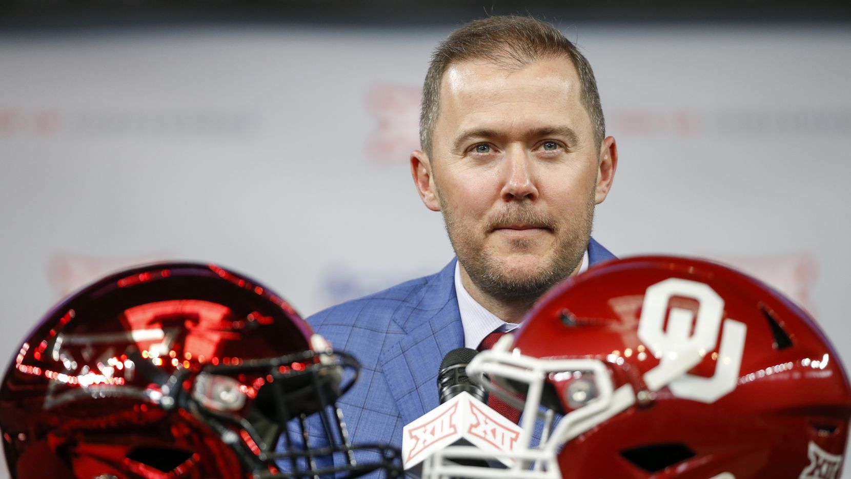 Oklahoma head football coach Lincoln Riley speaks during the Big 12 Conference Media Days at...