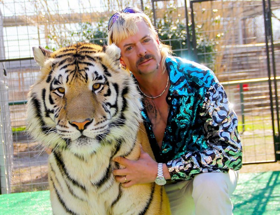 Joe Exotic with one of his many, many tigers in "Tiger King."