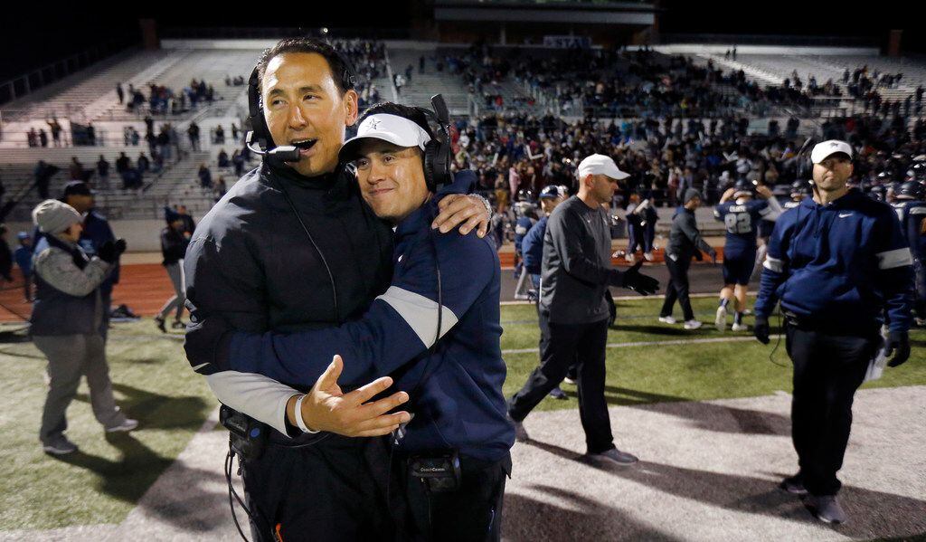 Frisco Lone Star head coach Jeff Rayburn (right) is congratulated by offensive coordinator Mark Humble after defeating Lancaster, 38-20, in their Class 5A Division I Regional championship at Wilkerson-Sanders Stadium in Rockwall, Texas, Friday, December 6, 2019. (Tom Fox/The Dallas Morning News)