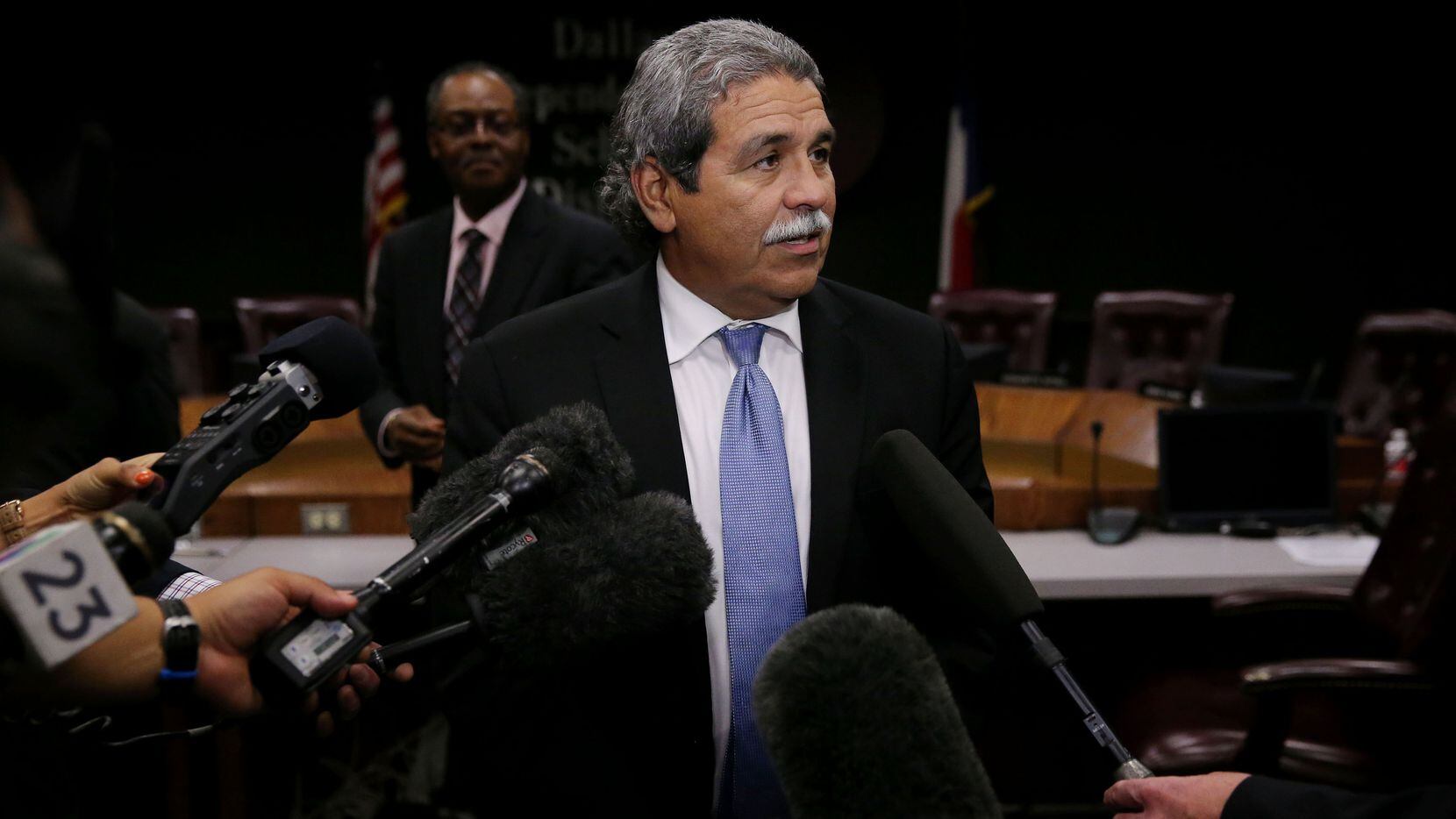  Superintendent Michael Hinojosa spoke to media after he was voted in as superintendent at a...