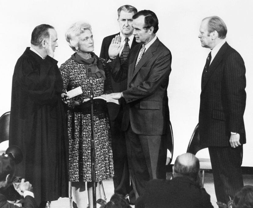 1976: George H.W. Bush (second from right) is sworn in as CIA diretor by Associate Supreme...