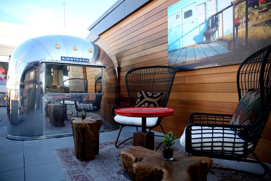 The renovated Airstream located on the third-floor patio of Haywire had to be lifted to its...